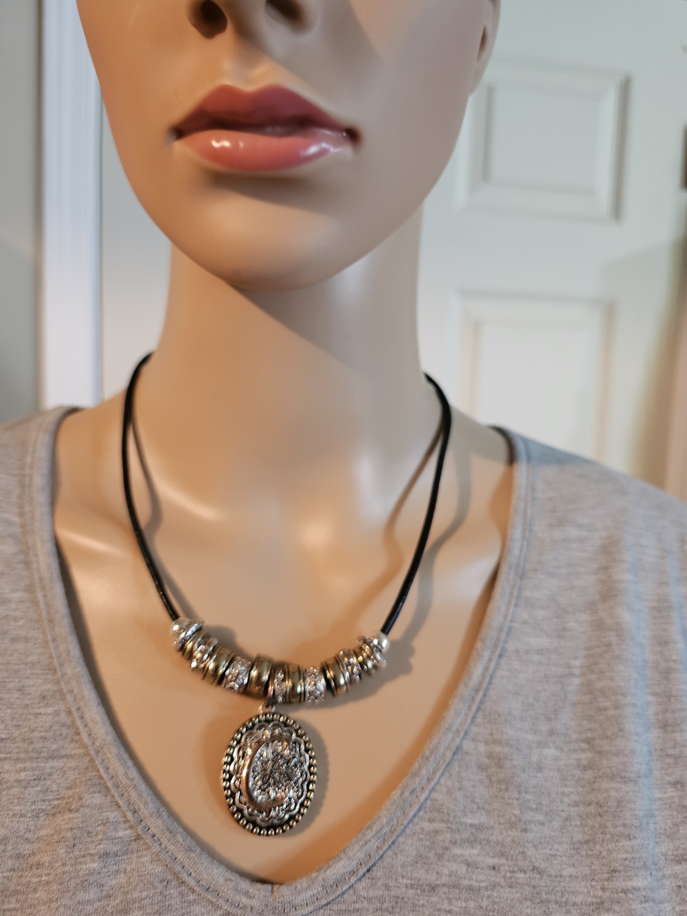 Black Cord Necklace with Silver Medallion Pendant